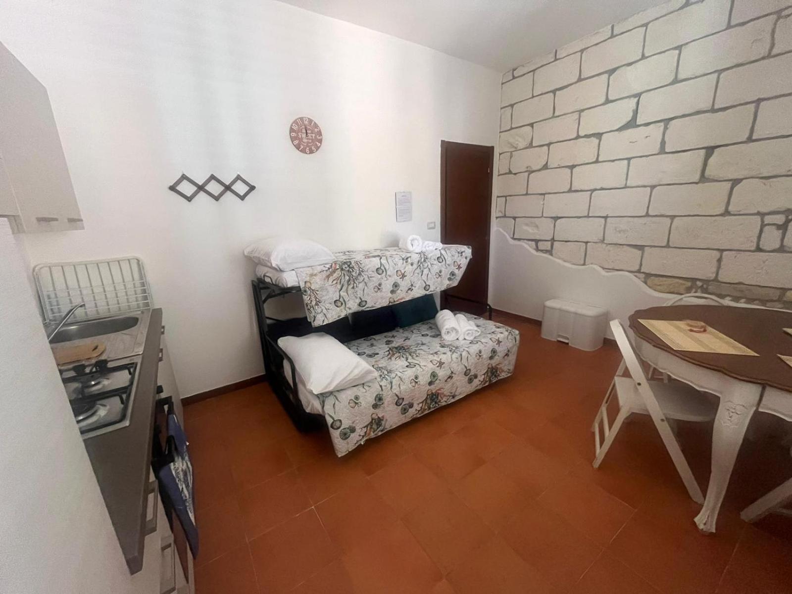 Hotel Moncici House à Porto Torres Extérieur photo